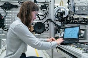 Female Engineer Working in Workshop